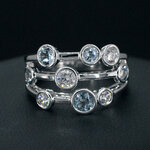 Witgouden design ring met aquamarijn en diamant