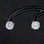Witgouden solitair oorbellen met 4.00 carat aan natuurlijke diamanten