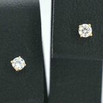 Gouden oorbellen met diamant