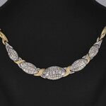 Gouden ketting met witgouden schakels