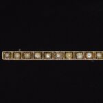 Gouden broche met parels
