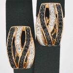 Rosegouden design oorbellen met witte en zwarte briljanten diamanten