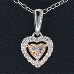 Witgouden hartvormige hanger met natuurlijke roze en witte diamant