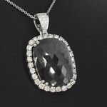 Witgouden hanger met witte en zwarte diamanten , excl. ketting