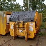 Perscontainer voorzien van haakarm Kiggen