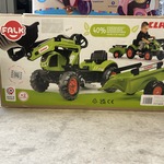 Claas traptractor met aanhanger Falk