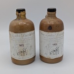 2x Kruik met Ome Loeks Peerdeburger “1417, 1456”