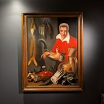 Keukenmeid met haan en stilleven van groenten en vruchten, Olieverf op