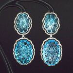 Bijzondere oorbellen met natuurlijke edelstenen en diamant