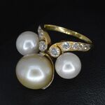 Gouden ring met diamanten en parels