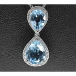 Witgouden entourage hanger bezet met topaas en diamanten, excl. kettin