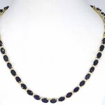 Geelgouden collier met diamanten en saffier