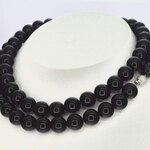 Halsketting met Onix edelsteen en een witgouden sluiting met diamant