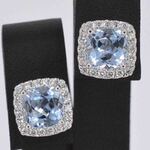 Witgouden entourage oorbellen met grote topazen en diamanten