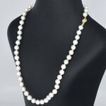 Parelsnoer met gouden sluiting met diamant