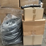 Partij stofzuigerslangen en stofzuigerzakken