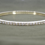 Gouden vaste armband met briljant geslepen diamanten