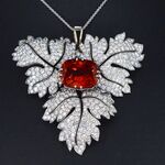 Witgouden hanger met diamanten en edelsteen spessartien van 13 carat