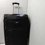 Zwarte stevige reiskoffer op wielen Royalty Rolles, zwart