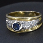 Gouden ring met diamanten en saffier