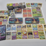 Pokémon collectie met vintage kaarten, blikken boxen en grote partij k