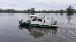 (Locatie Nationaal Park De Biesbosch) Werkboot met 15pk buitenboordmot