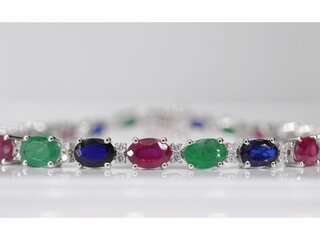Witgouden tennisarmband met diamanten, saffier, robijn en smaragd