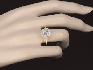 Gouden entourage ring met diamanten en een briljant