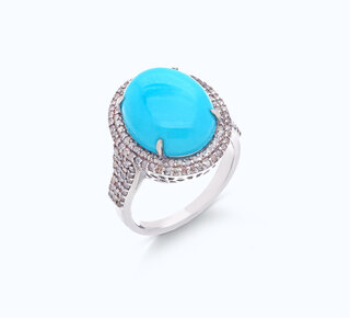 Ring met een grote ovale turquoise en natuurlijke diamanten