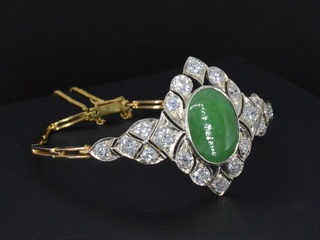 Gouden armband met diamanten en jade