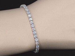 Witgouden tennisarmband met 7.16 carat briljant geslepen diamanten (EC