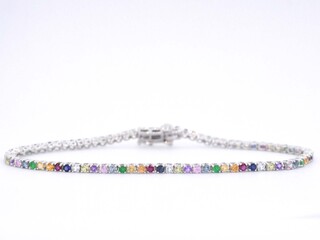 Witgouden tennisarmband met multi colour edelstenen