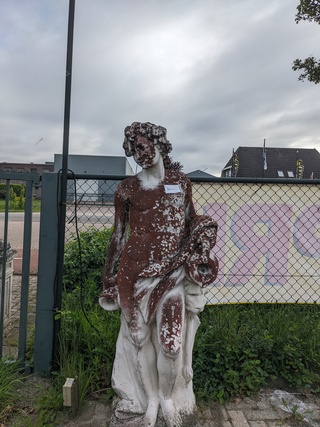 Tuinbeeld man met leeuw