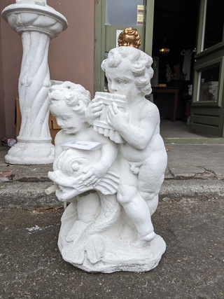 Waterornament met putti