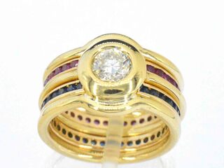 Gouden ring met diamant, robijnen en saffieren
