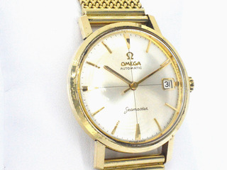 Geelgouden horloge met Milanese band van het merk Omega