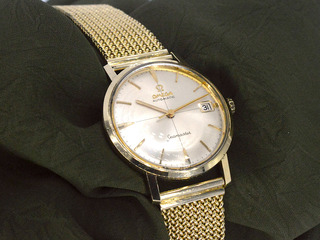 Geelgouden horloge met Milanese band van het merk Omega