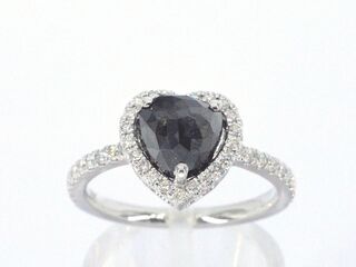 Witgouden ring met witte en zwarte diamant