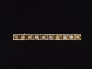 Gouden broche met parels