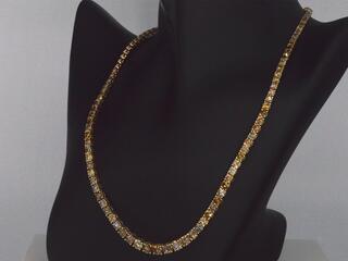 Gouden tennis collier met champagne en cognac diamanten