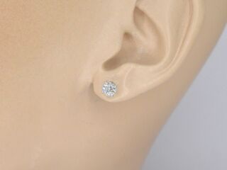 Witgouden solitair oorbellen met diamanten