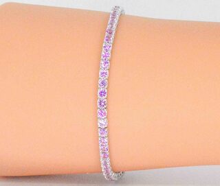 Gouden tennisarmband met 6.00 carat aan roze saffieren