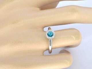 Gouden ring met natuurlijke diamanten en een swiss blue topaas