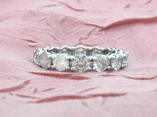 Witgouden alliance ring met briljant geslepen diamanten