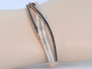 Rosegouden design armband met witte en zwarte briljanten diamanten