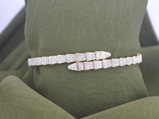 Gouden armband van serpent model met natuurlijke diamanten