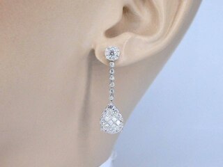 Druppelvormige oorhangers met briljant en princess geslepen diamanten
