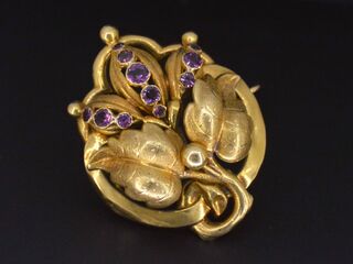 Gouden broche met amethist