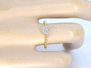 Gouden ring met een hartje vol gezet met diamanten