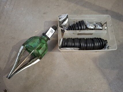 Aandrijfashoesspreider